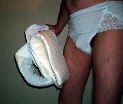 in panties preparing to put on a diaper
