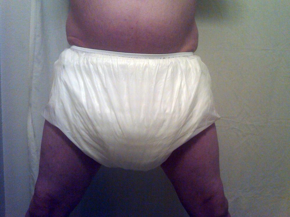 Nicely Diapered
New Diaper And Plastic Pants
Keywords: Cloth Plastic Diaper Diapers Vinyl