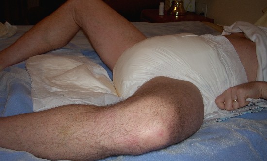 love putting on super thick adult pampers.
