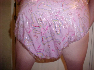 Back of Soaked Pink Barbie Plastic panties and Diaper
Sissy Kimberly bent over Toliet showing The Back of Her Soaked Pink Barbie Plastic panties and Diaper
