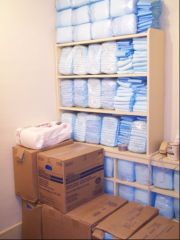 A well stocked diaper supply waiting to be used