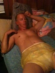 yelllow plastic pants On Bed