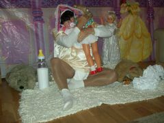On floor with Doll