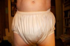 White GaryWear PUL pants over cloth diaper
