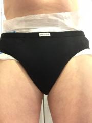 Black bikini briefs hold up NorthShore Lite Supreme