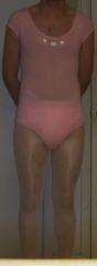 Pink leo, white tights and diaper showing through leotard