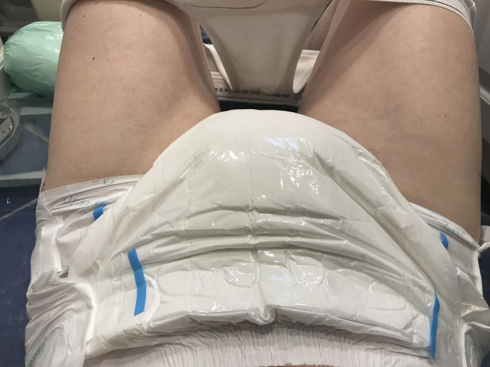 Gobphus in a soaked NorthShore MegaMax diaper and large booster pad.