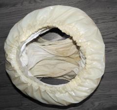 wet cloth diaper and booster pad in 2 plastic pants.jpg