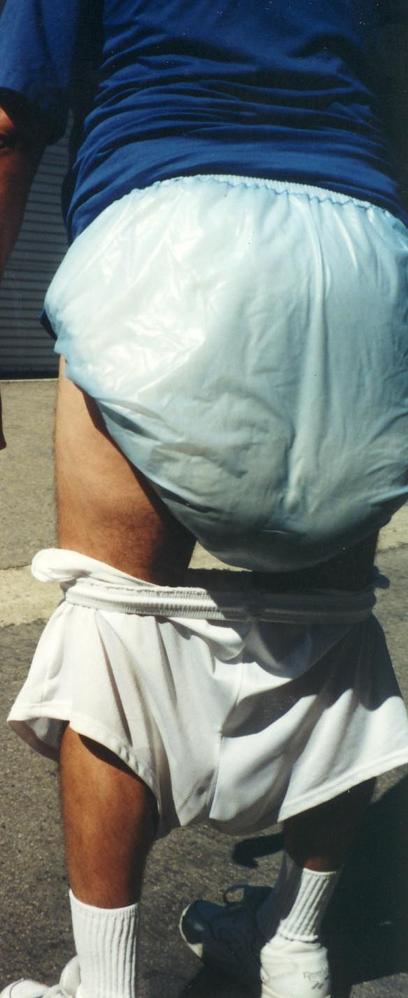 Well diapered at work too!
LooK! No leaks! Happiness is wetting all day in poop filled diapers, and not having to change them, until you get home from work.  
Keywords: messy Poopfilled   wetandpoopfilled  public clothdiapers