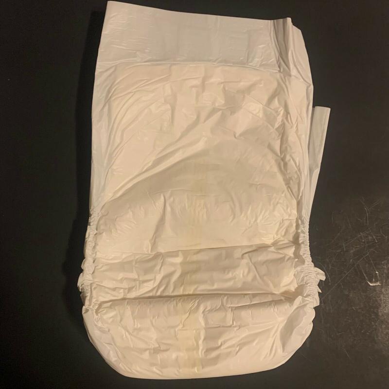 Ultra Attends Plus Wrap-Around Disposable Briefs - Maximum Absorbency - Medium (fits 32'' to 44'' hips) - 10pcs - 79
