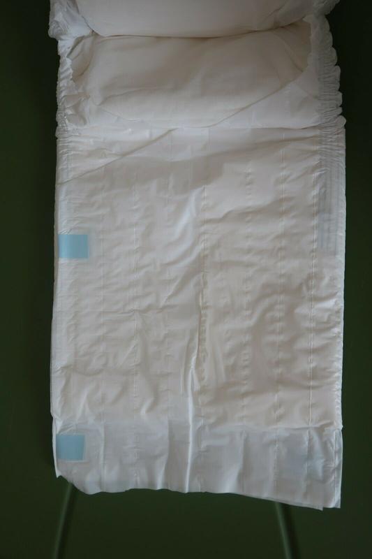 Ultra Attends Plus Wrap-Around Disposable Briefs - Maximum Absorbency - Medium (fits 32'' to 44'' hips) - 10pcs - 47
