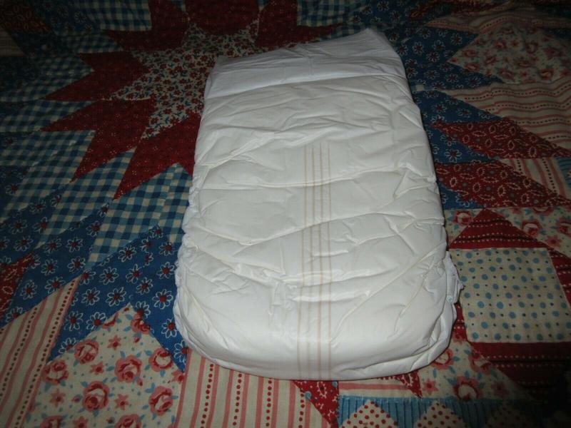 Ultra Attends Plus Wrap-Around Disposable Briefs - Maximum Absorbency - Small (fits 20'' to 31'' hips) - 10pcs - 29
