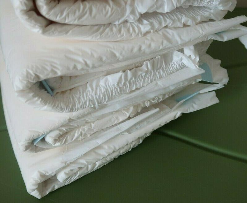 Ultra Attends Plus Wrap-Around Disposable Briefs - Maximum Absorbency - Medium (fits 32'' to 44'' hips) - 10pcs - 42
